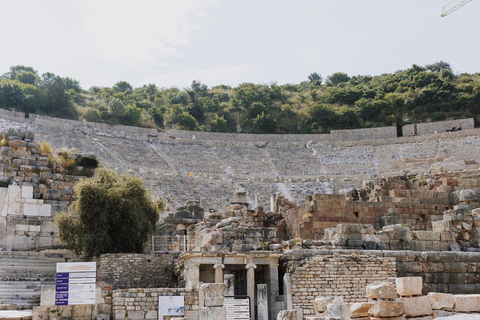 Wide curved seating tiers of the Great Theater cut into a hillside