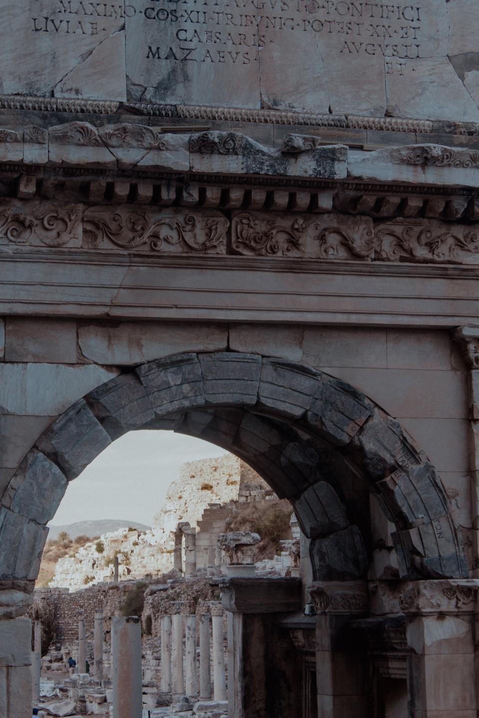 Close view of the ancient Mazeus and Mithridates Gate arch with Latin inscription